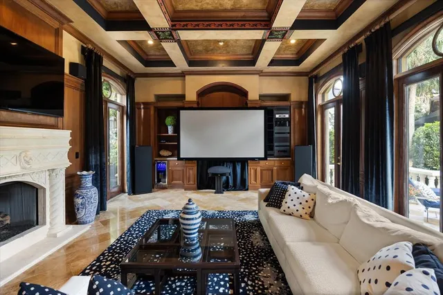 a bed sitting in a room next to a window