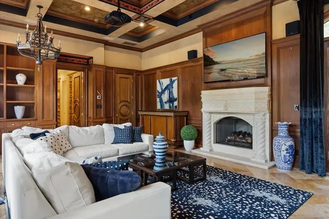 a view of backyard with plants and outdoor seating
