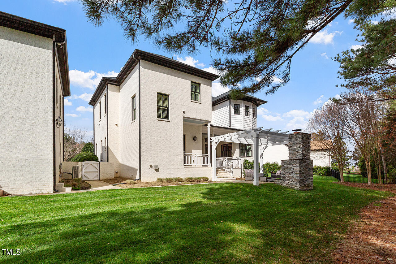 2000 Greyhawk Place Apex, NC 27539 - Photo 13 of 59 a view of a house with a yard