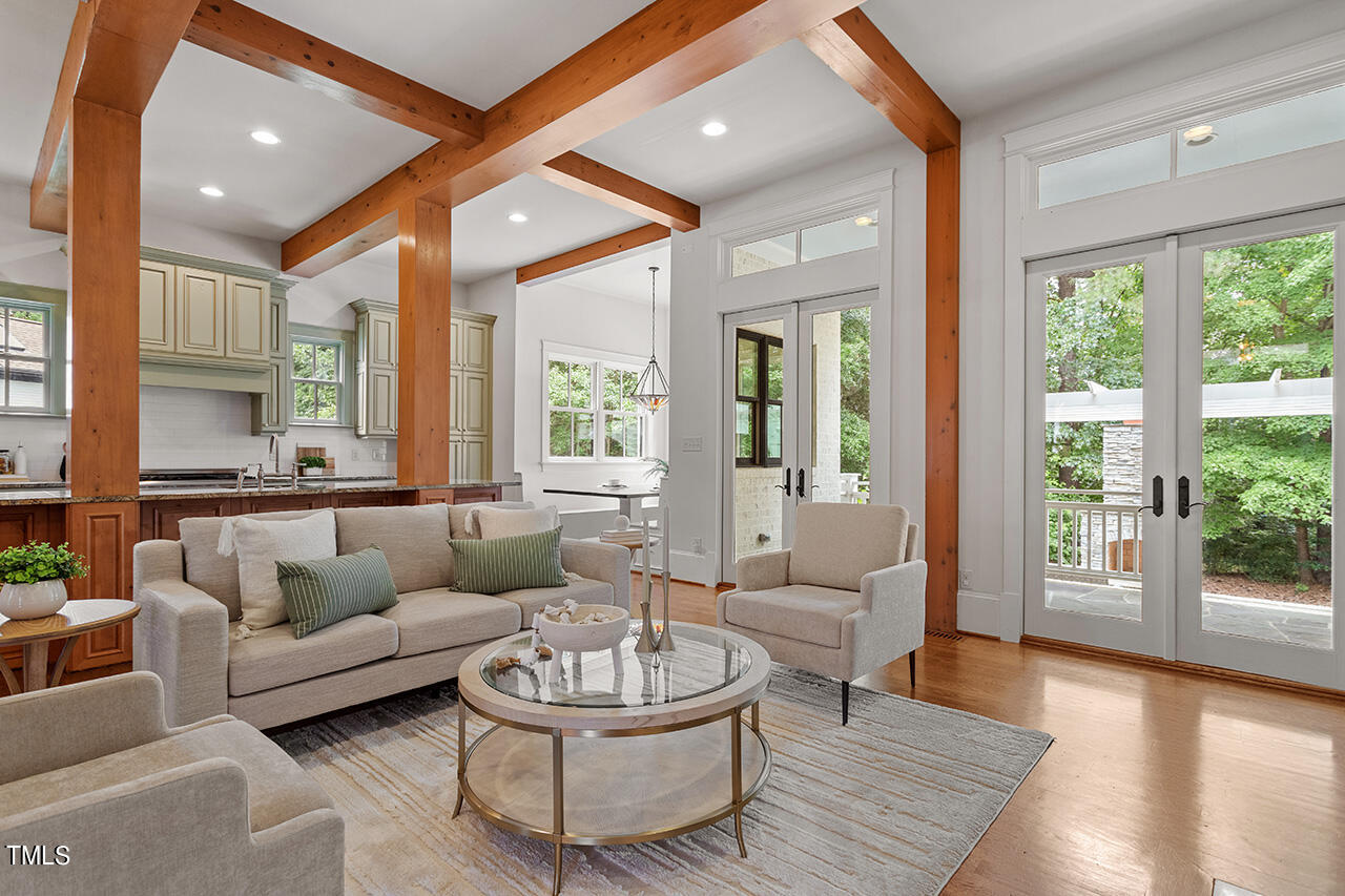 2000 Greyhawk Place Apex, NC 27539 - Photo 14 of 59 a living room with furniture and a large window