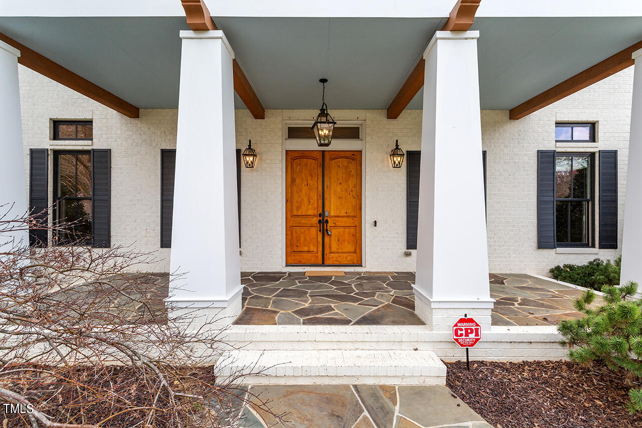 2000 Greyhawk Place Apex, NC 27539 - Photo 2 of 59 a front view of a house with a yard