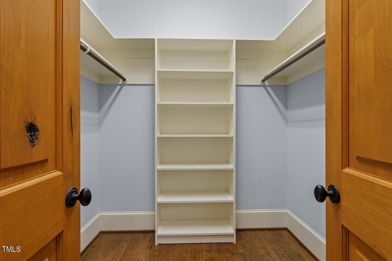 2000 Greyhawk Place Apex, NC 27539 - Photo 33 of 59 a view of a room with wooden floor and closet