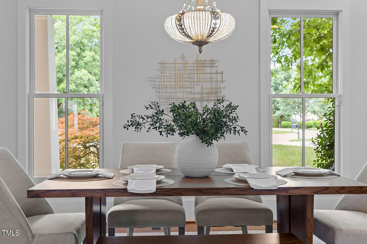 2000 Greyhawk Place Apex, NC 27539 - Photo 4 of 59 a view of a dining room with furniture window and outside view