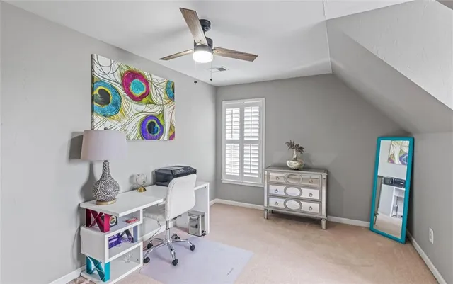 a living room with furniture and window