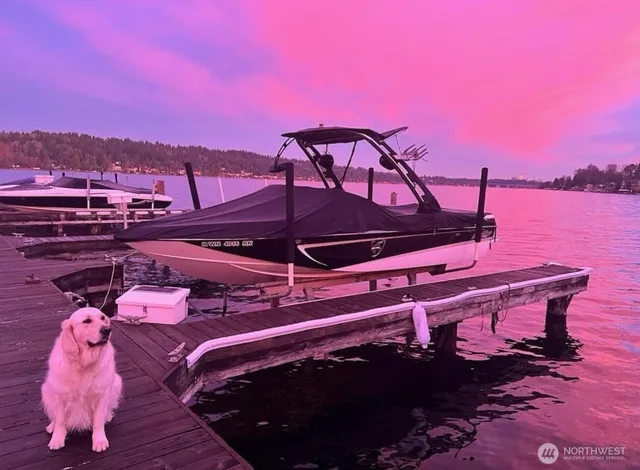 a view of a balcony with table and chairs