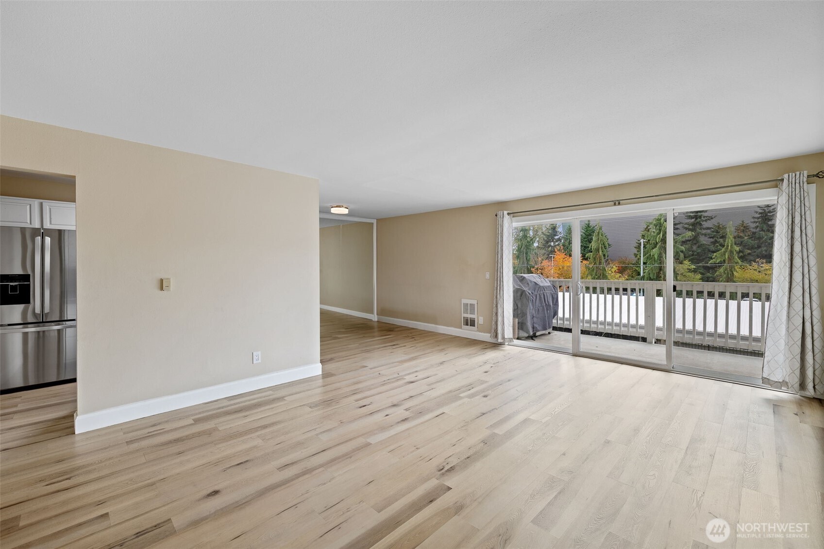 5021 Ripley Lane North, Unit 212 Renton, WA 98056 - Photo 30 of 34 a view of an empty room with a window