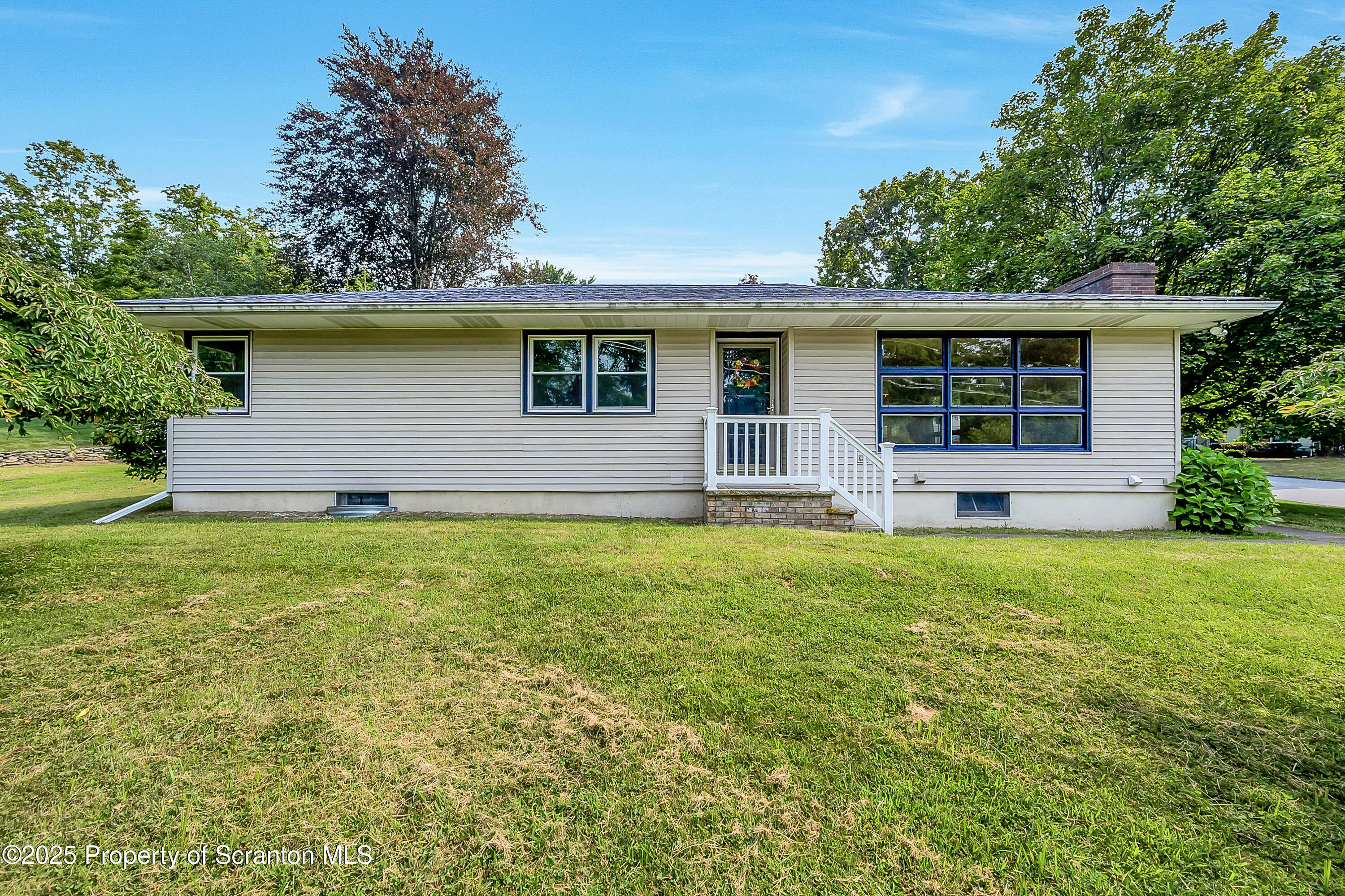 101 Old Post Road Clarks Summit, PA 18411 - Photo 2 of 48 a house view with a garden space