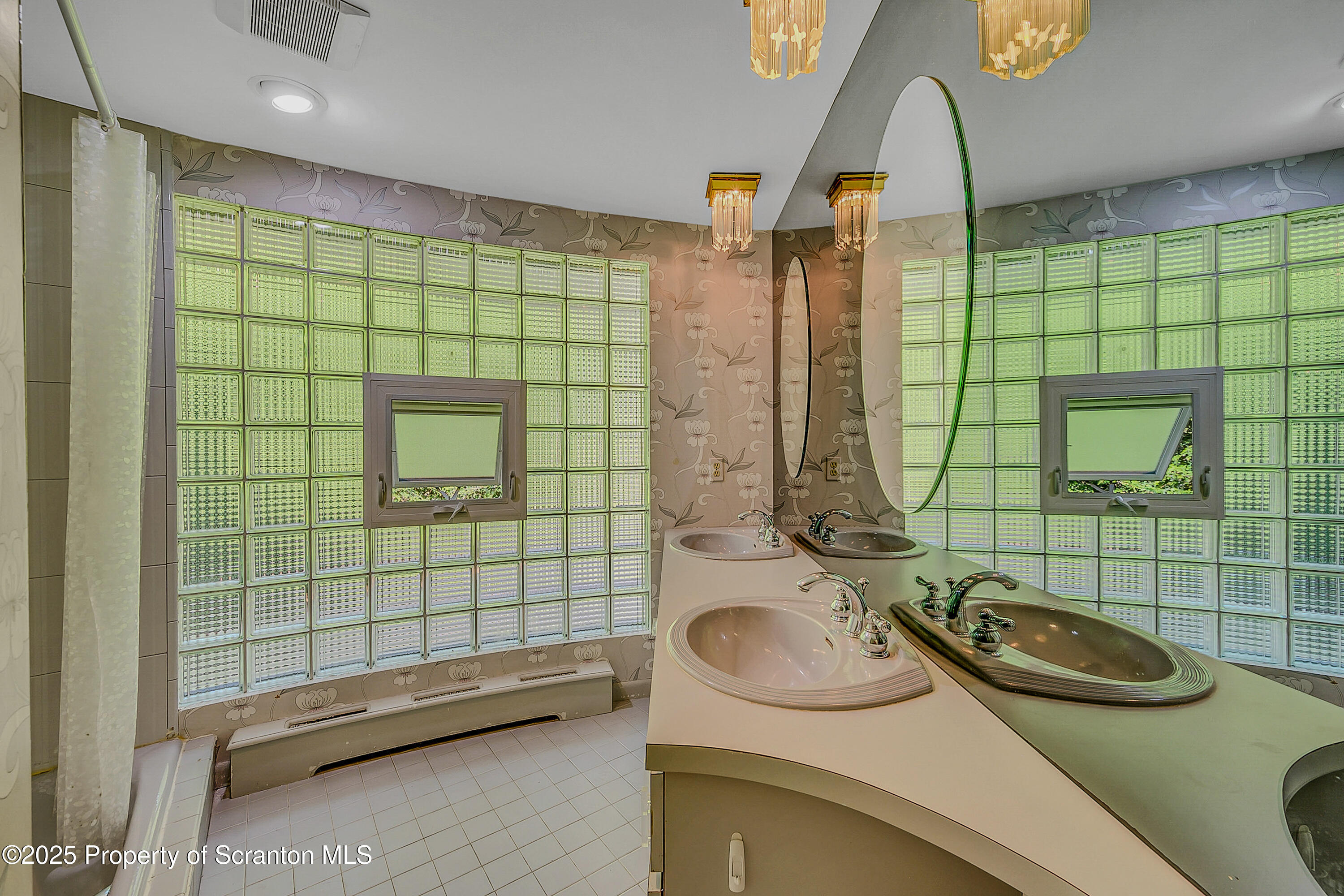 101 Old Post Road Clarks Summit, PA 18411 - Photo 25 of 48 a bathroom with a sink a toilet and shower