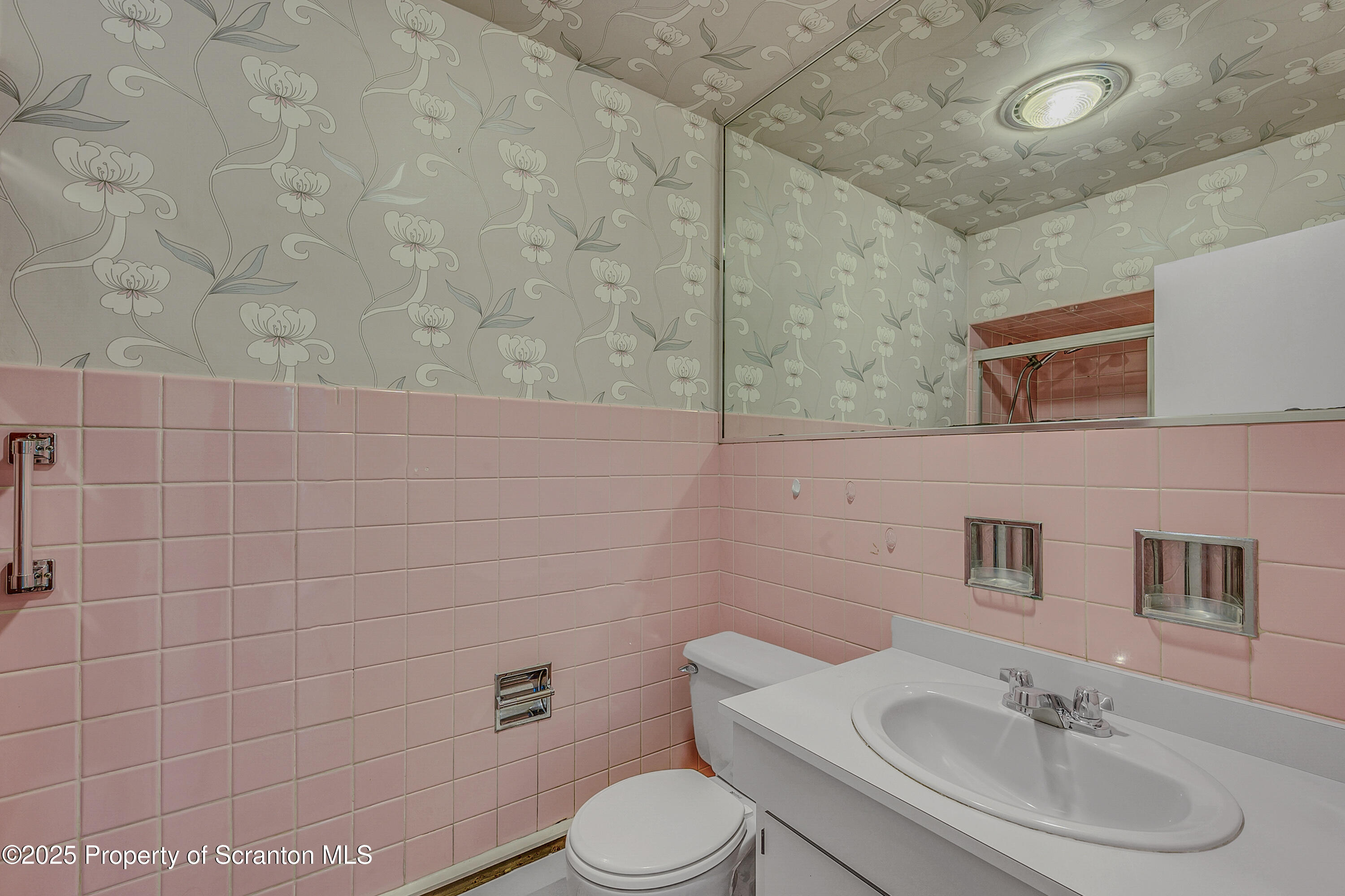 101 Old Post Road Clarks Summit, PA 18411 - Photo 33 of 48 a bathroom with a sink toilet and mirror