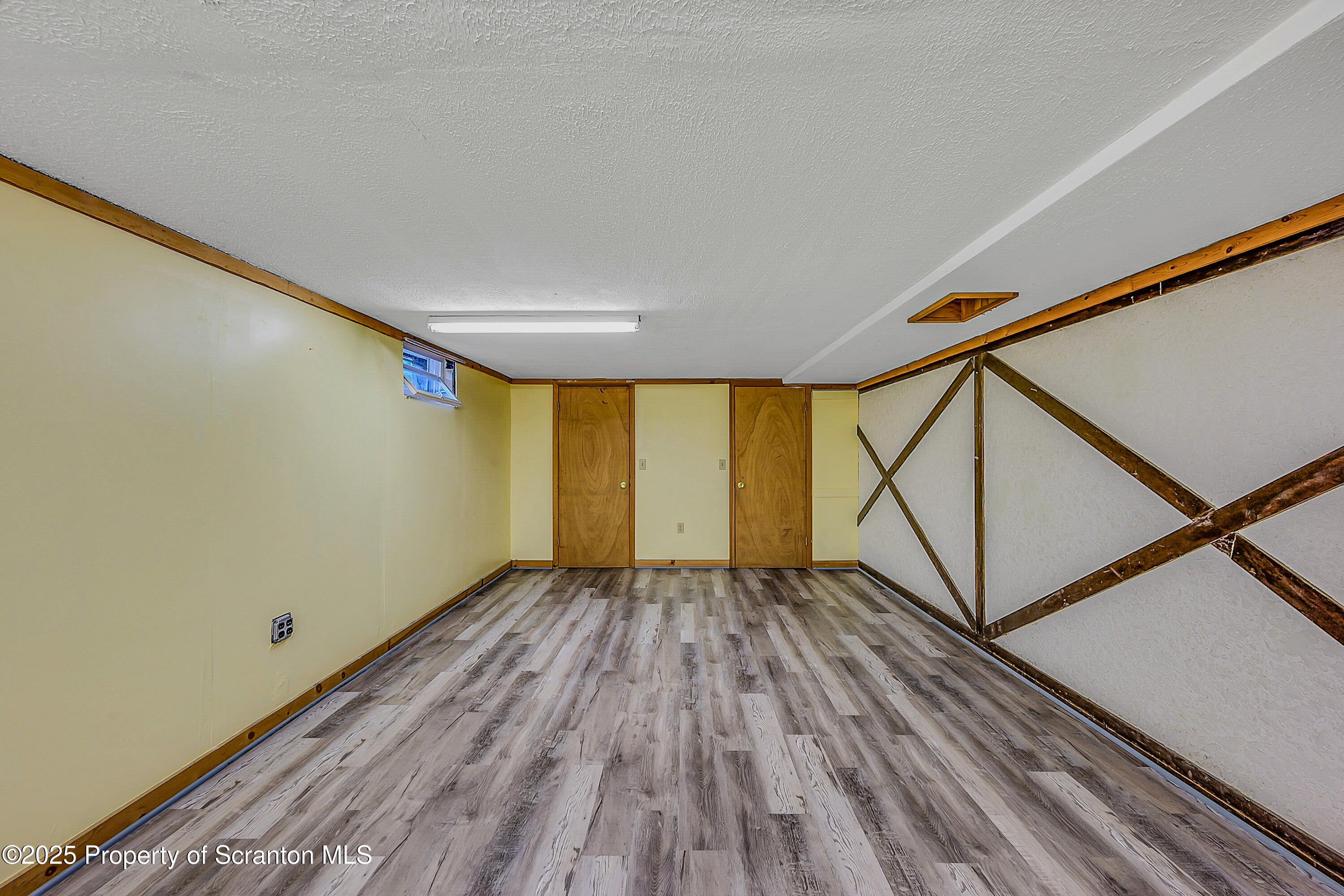 101 Old Post Road Clarks Summit, PA 18411 - Photo 42 of 48 a view of wooden floor in an empty room
