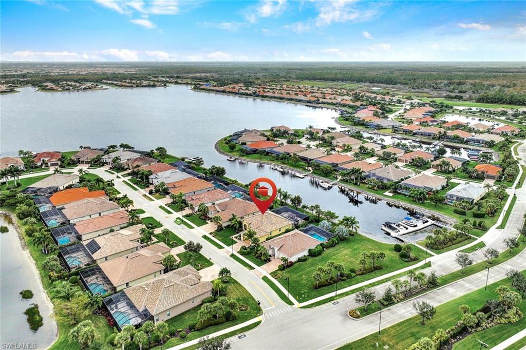 9111 Graphite Circle Naples, FL 34120 - Photo 26 of 33 an aerial view of a city