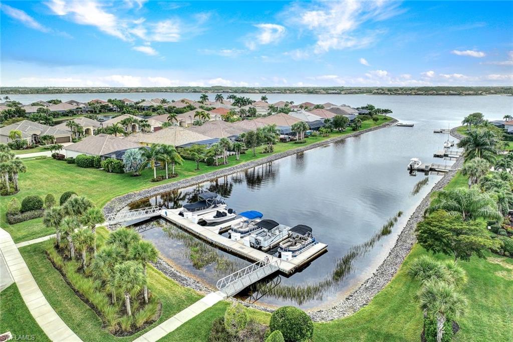 9111 Graphite Circle Naples, FL 34120 - Photo 28 of 33 a view of a lake with a city