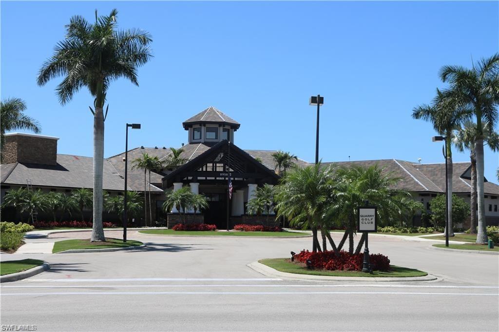 9111 Graphite Circle Naples, FL 34120 - Photo 32 of 33 a view of a street with houses