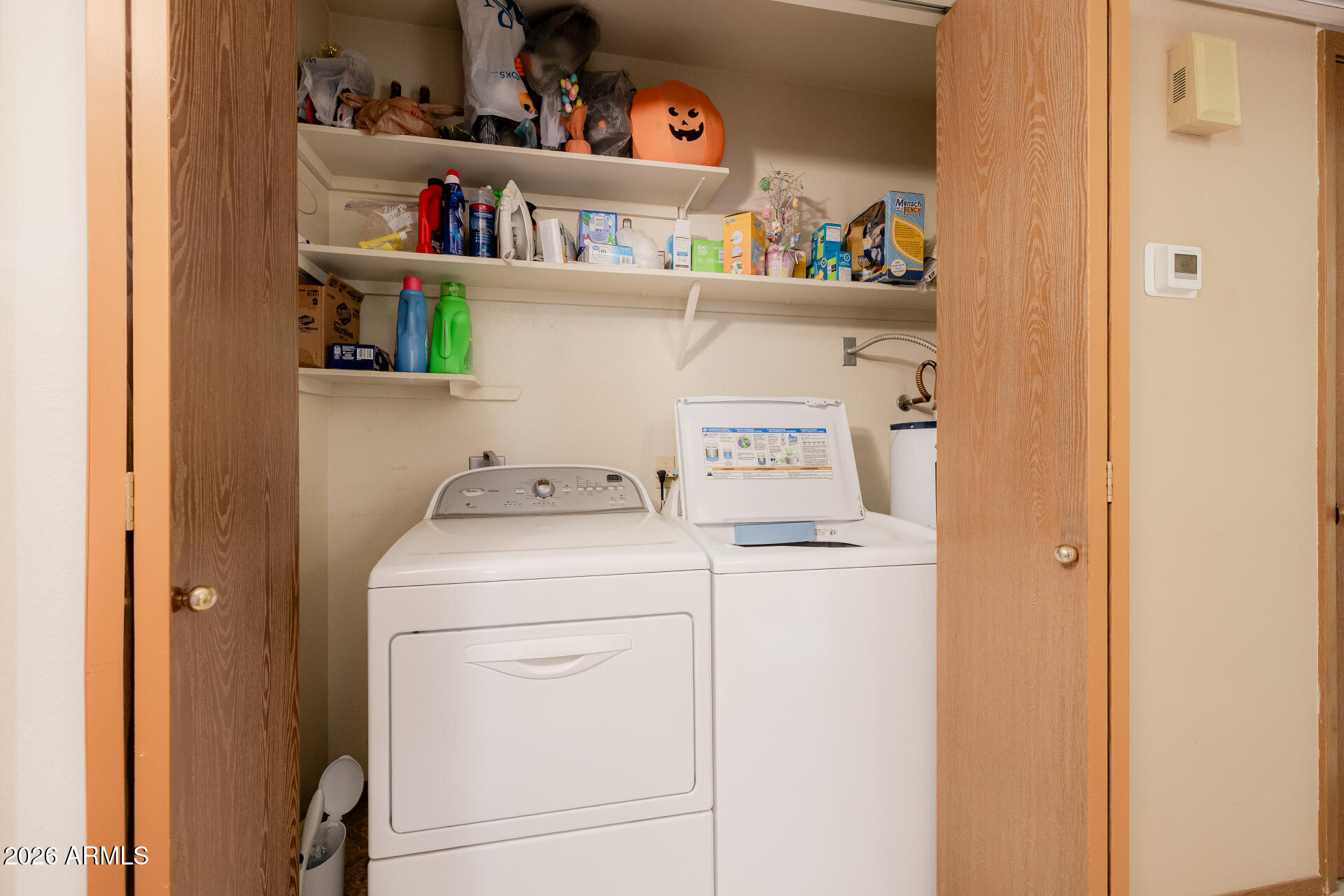 131 North Higley Road, Unit 16 Mesa, AZ 85205 - Photo 11 of 17 a utility room with dryer and washer