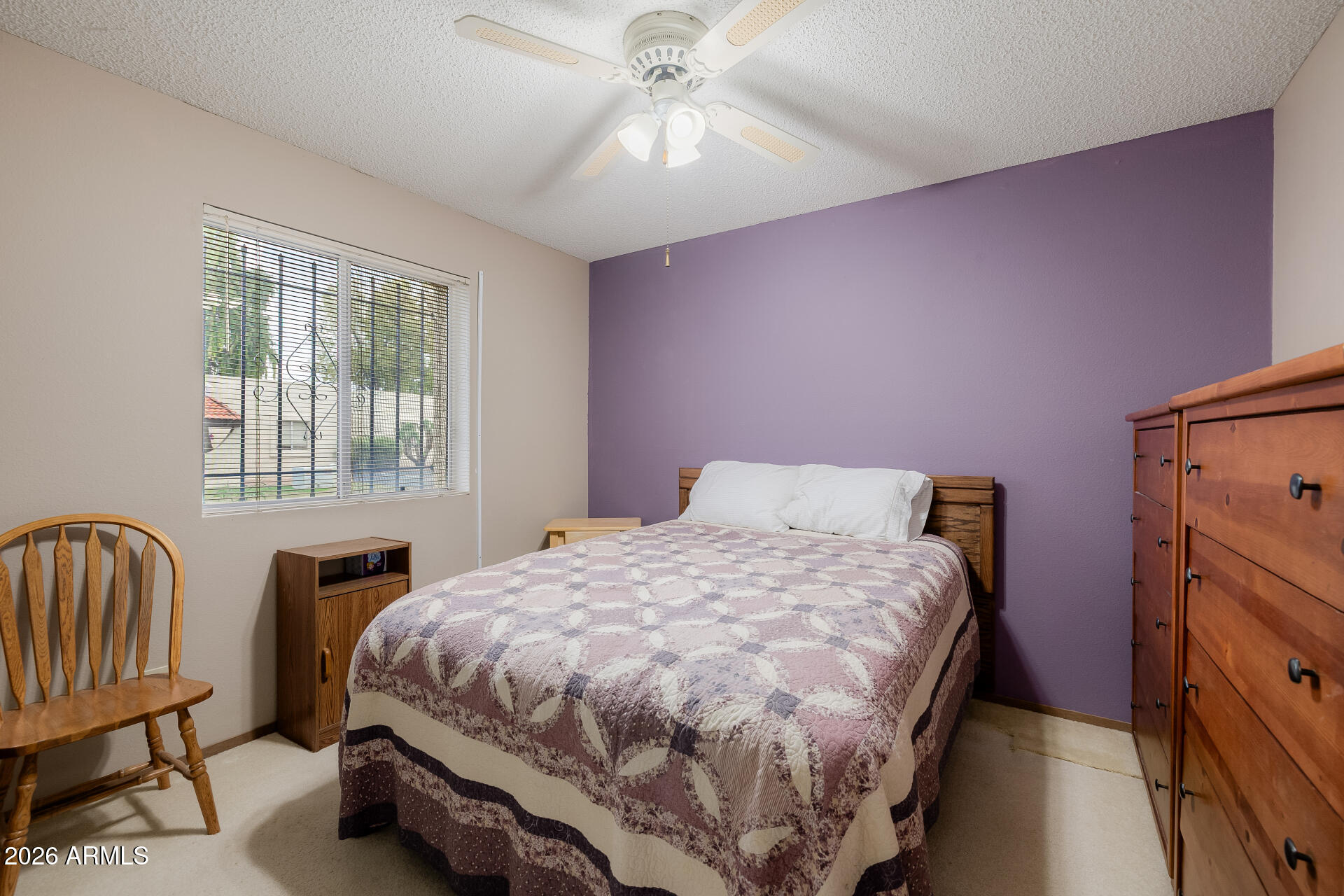 131 North Higley Road, Unit 16 Mesa, AZ 85205 - Photo 12 of 17 a bedroom with a bed and a window