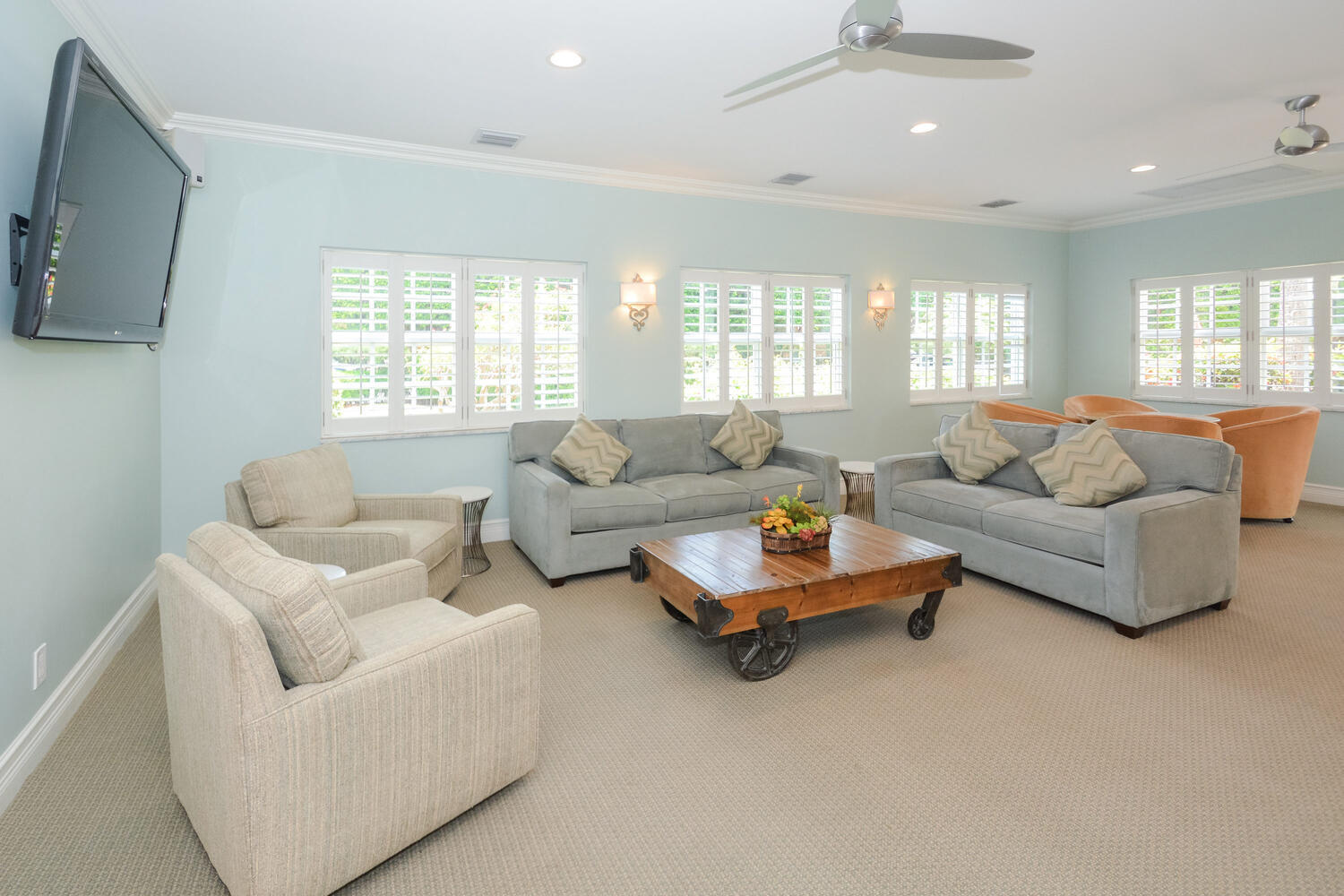 2871 North Ocean Boulevard, Unit F429 Boca Raton, FL 33431 - Photo 30 of 38 a living room with furniture and a flat screen tv