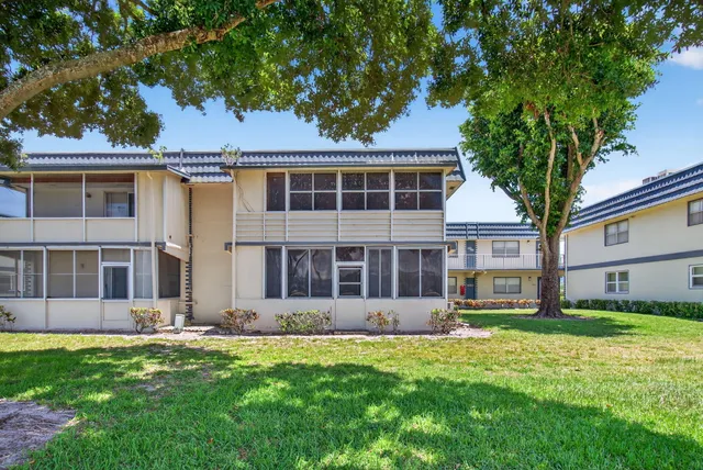 an aerial view of a city and lake view