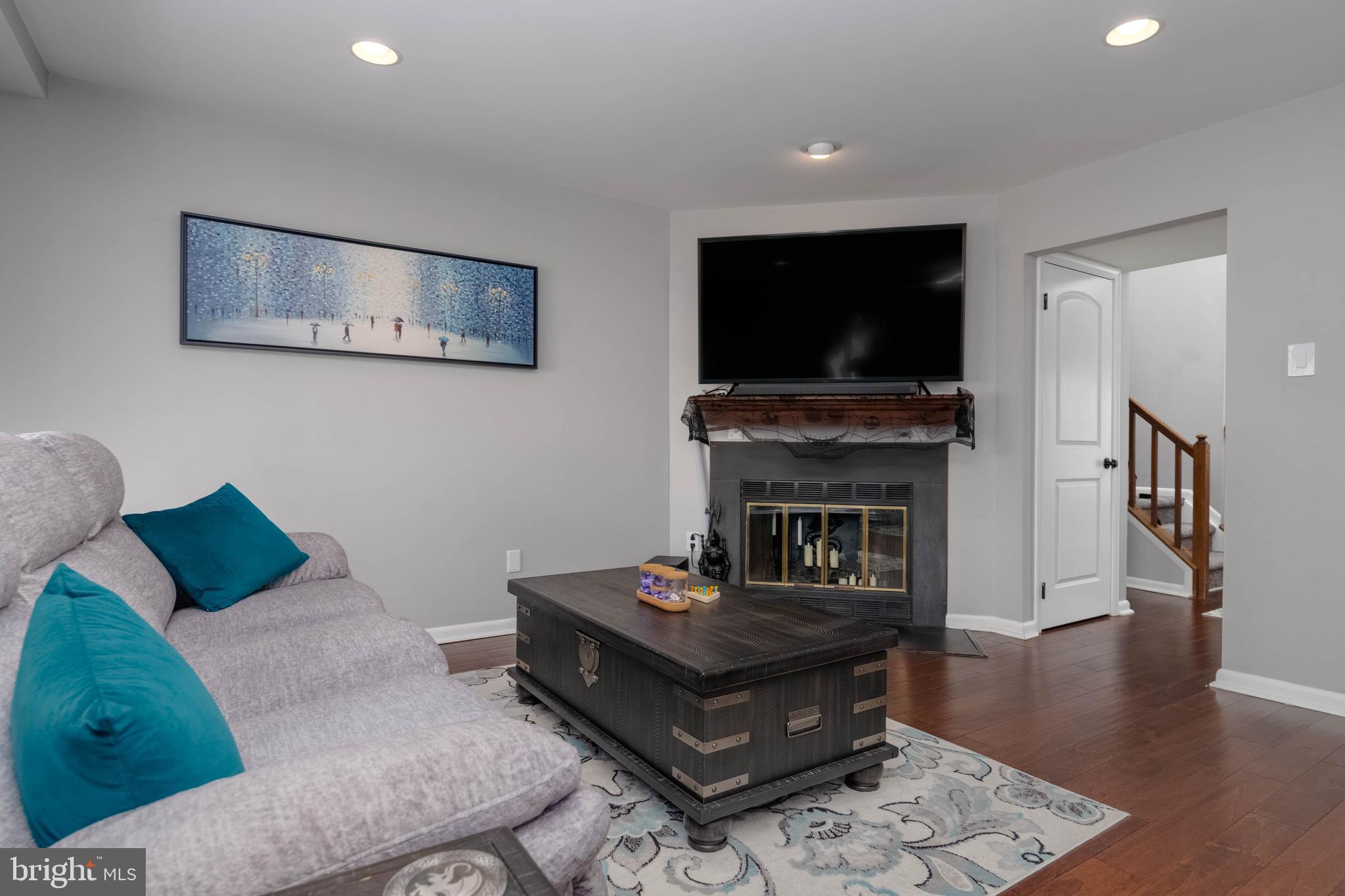 10 Millwheel Court Baltimore, MD 21236 - Photo 16 of 52 Living Room with Wood Burning Fireplace