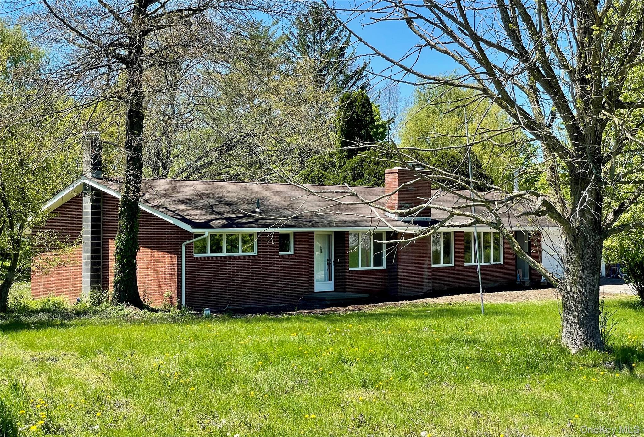 front view of house with a yard