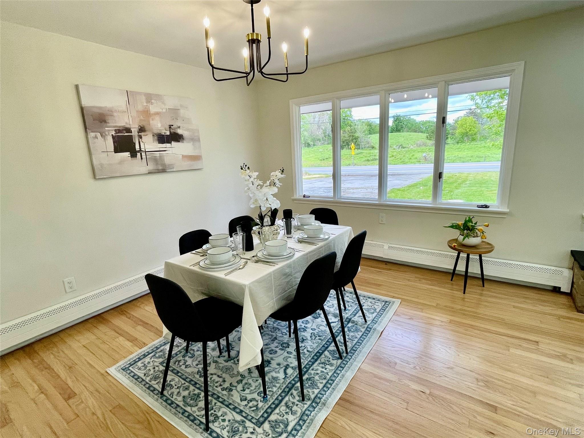 70 County Rte 17 Pine Bush, NY 12566 - Photo 12 of 36 a view of a dining room with furniture window and wooden floor