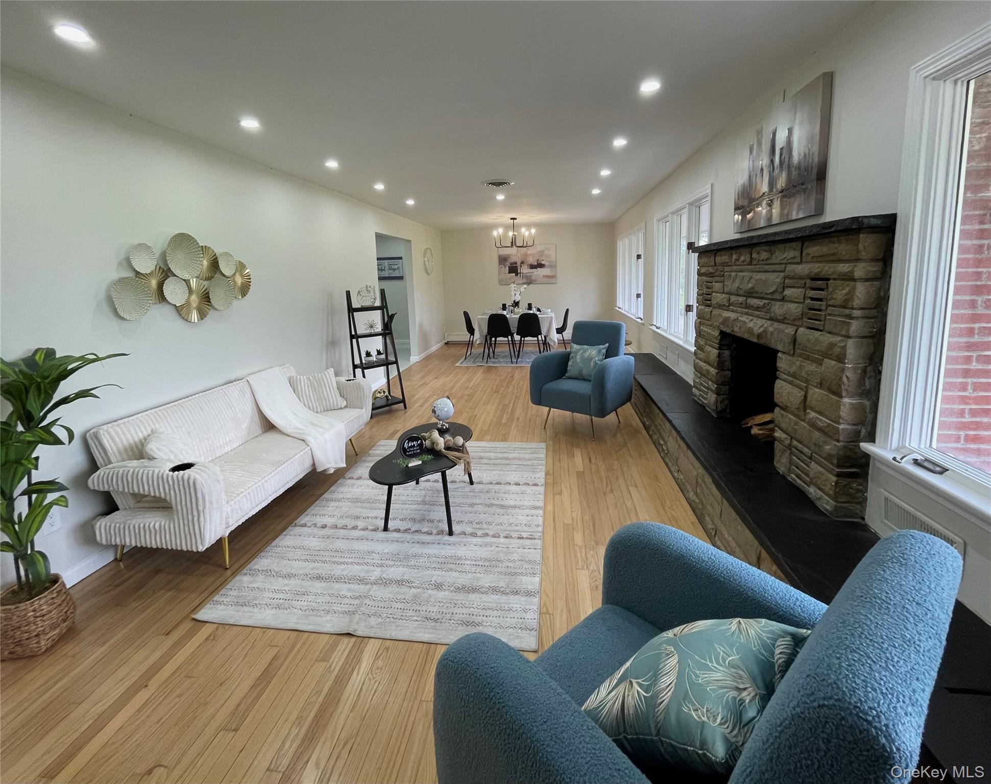 70 County Rte 17 Pine Bush, NY 12566 - Photo 16 of 36 a living room with furniture and a fireplace