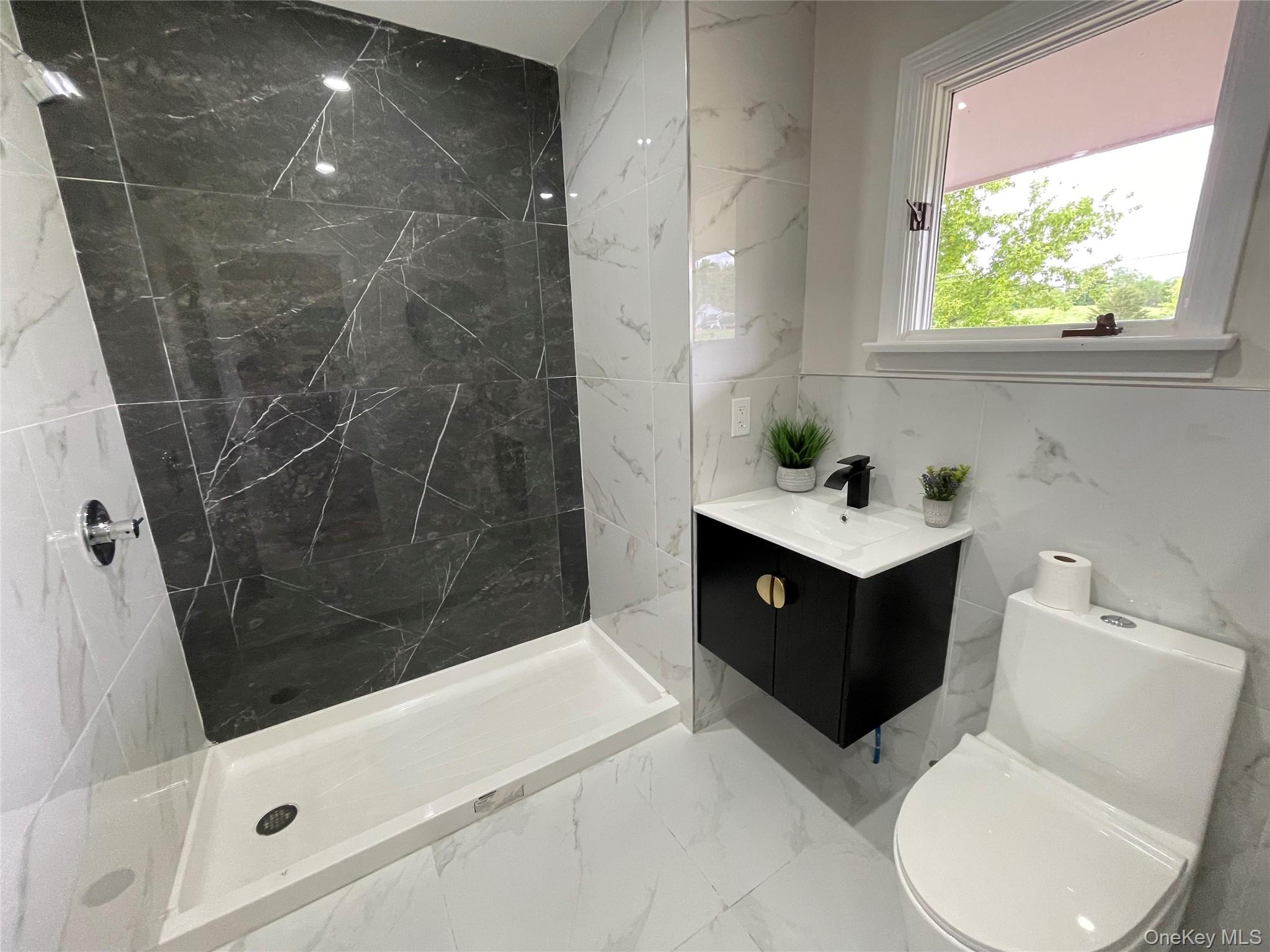 70 County Rte 17 Pine Bush, NY 12566 - Photo 26 of 36 a bathroom with a sink a toilet and shower