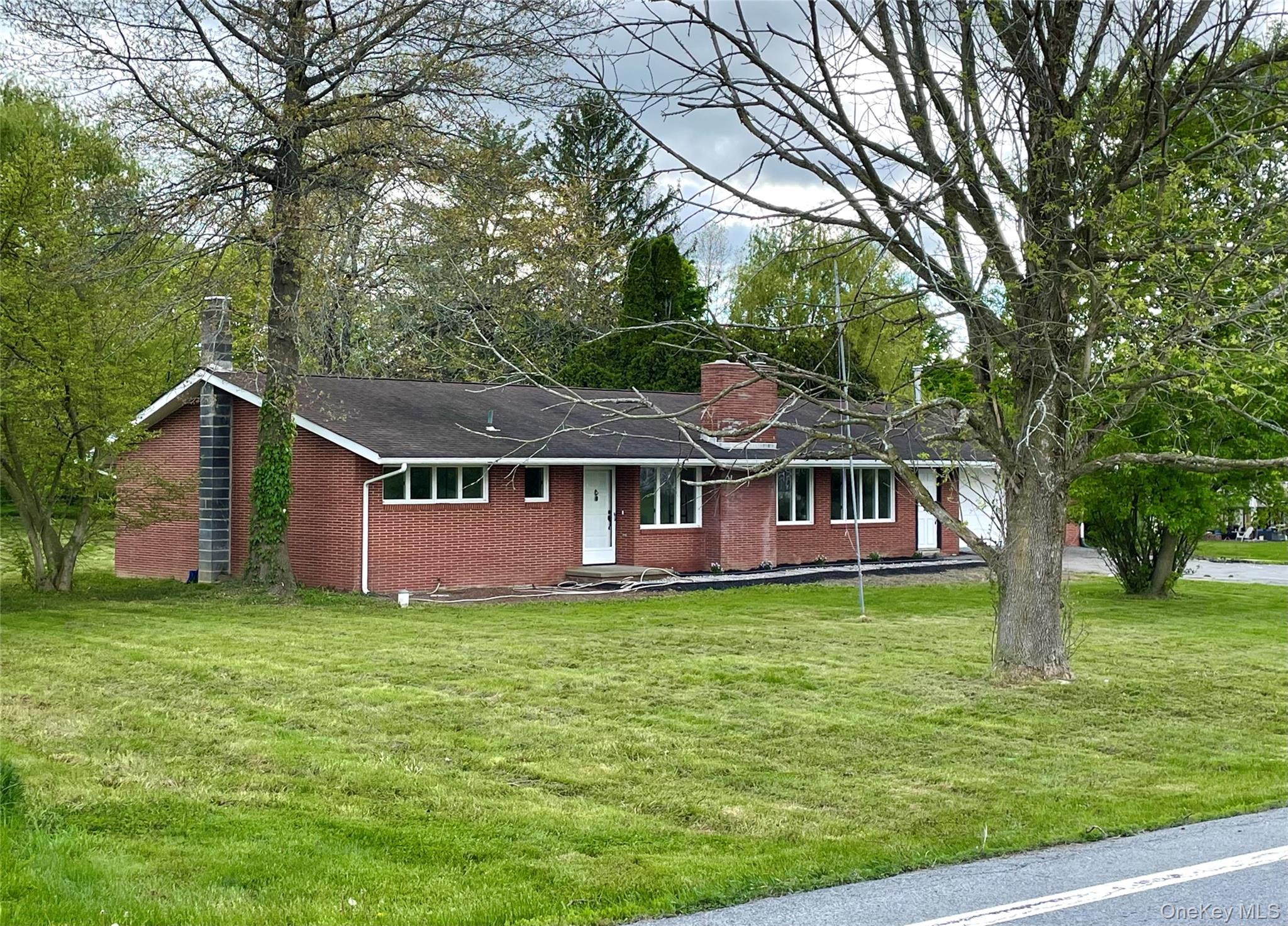 70 County Rte 17 Pine Bush, NY 12566 - Photo 35 of 36 a front view of a house with yard and green space
