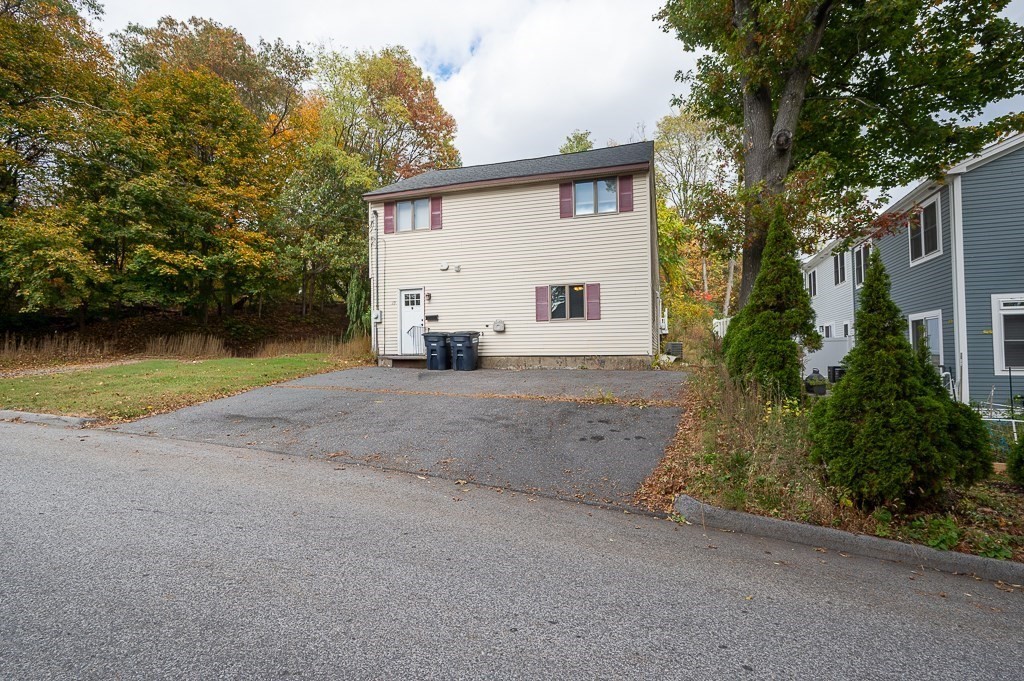 29 Dominion Road Worcester, MA 01605 - Photo 3 of 36 a view of a house with backyard and garden