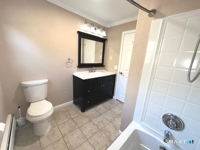 97 Country Hill Road, Unit 97 Naugatuck, CT 06770 - Photo 12 of 31 a bathroom with a toilet a sink a mirror and shower