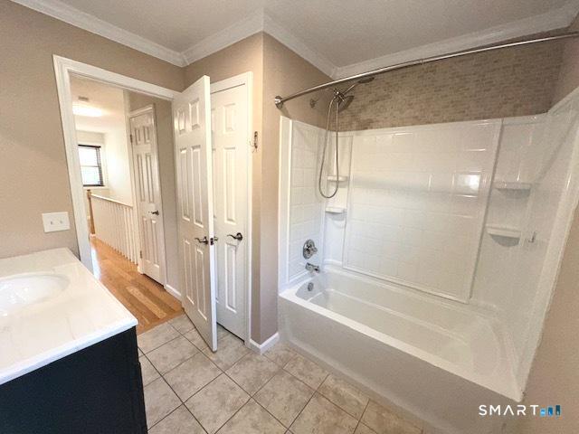 97 Country Hill Road, Unit 97 Naugatuck, CT 06770 - Photo 13 of 31 a spacious bathroom with a glass shower door and a bathtub