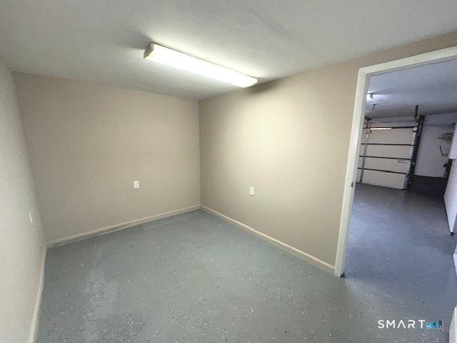 97 Country Hill Road, Unit 97 Naugatuck, CT 06770 - Photo 20 of 31 a view of an empty room