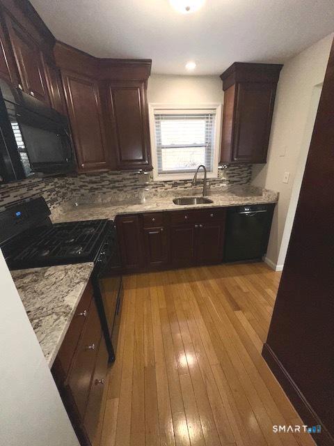 97 Country Hill Road, Unit 97 Naugatuck, CT 06770 - Photo 2 of 31 a view of kitchen with granite countertop window