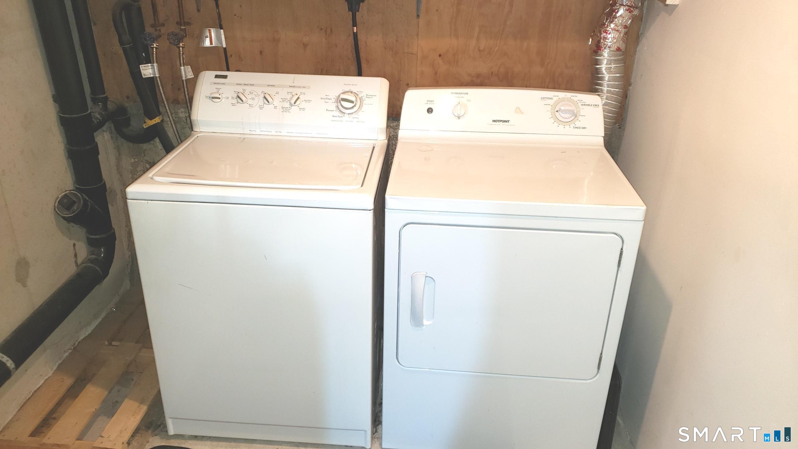 97 Country Hill Road, Unit 97 Naugatuck, CT 06770 - Photo 22 of 31 a utility room with dryer and washer