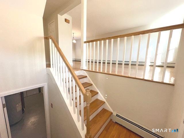 97 Country Hill Road, Unit 97 Naugatuck, CT 06770 - Photo 29 of 31 a view of an entryway with wooden floor