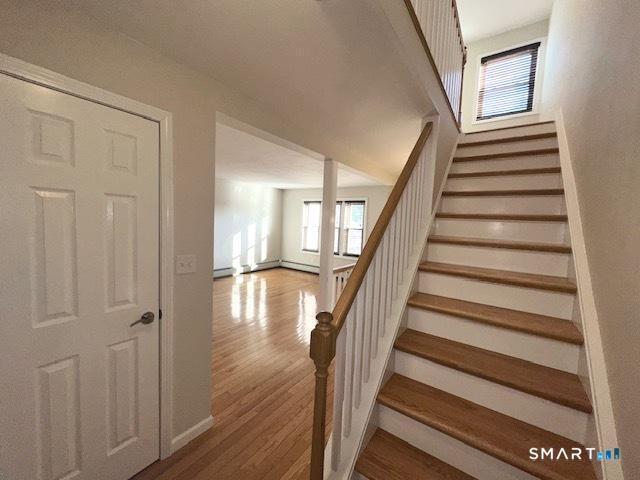 97 Country Hill Road, Unit 97 Naugatuck, CT 06770 - Photo 7 of 31 a view of entryway with wooden floor