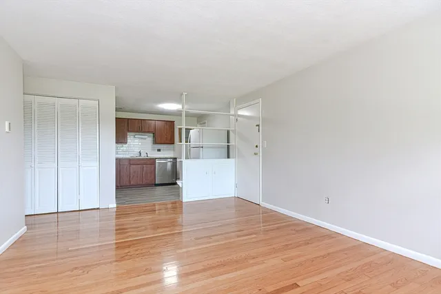 a view of kitchen with wooden floor