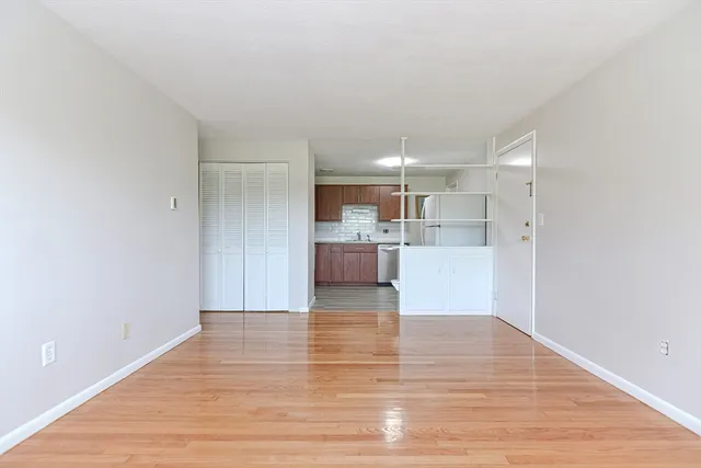 a view of kitchen with wooden floor