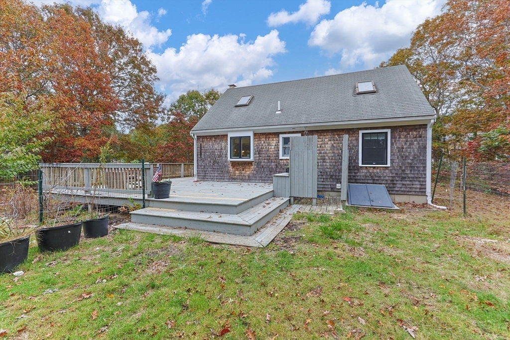 30 Mayflower Road Eastham, MA 02642 - Photo 30 of 38 front view of a house with a yard