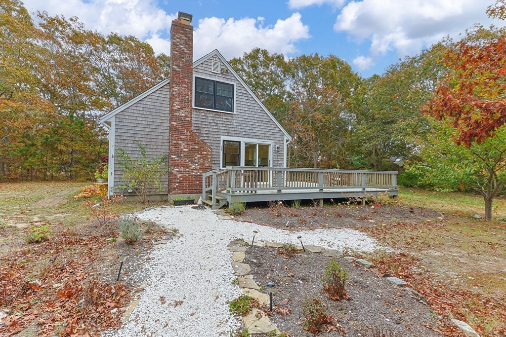30 Mayflower Road Eastham, MA 02642 - Photo 35 of 38 a view of a house with a yard