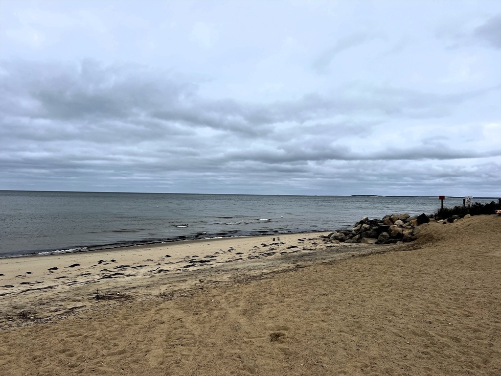 30 Mayflower Road Eastham, MA 02642 - Photo 37 of 38 a view of a beach with an ocean beach