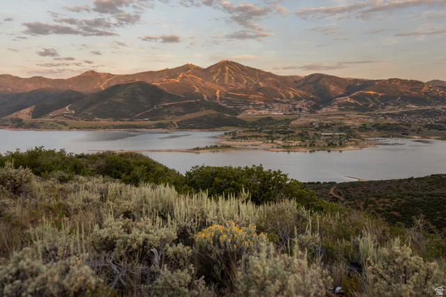 9269 North Sunset Road Kamas, UT 84036 - Photo 1 of 21 Expansive mountain and lake scenery featuring a distant marina and varied terrain
