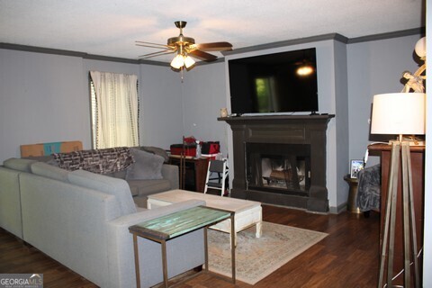 302 James Place Macon, GA 31220 - Photo 2 of 9 a living room with furniture and a fireplace