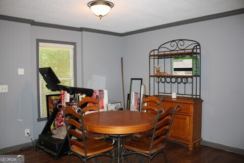 302 James Place Macon, GA 31220 - Photo 3 of 9 a view of a room with gym equipment