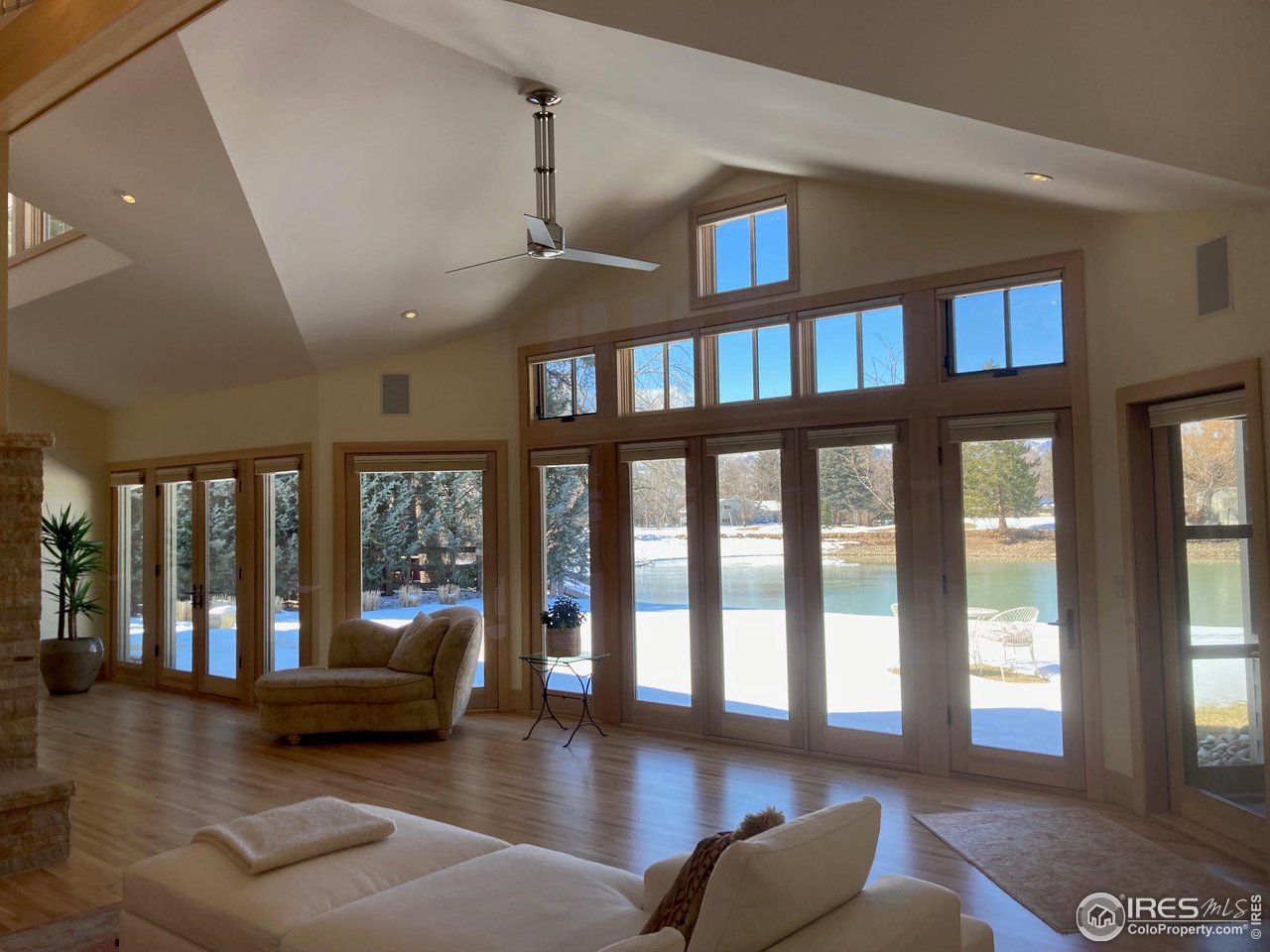 7115 Rustic Trail Boulder, CO 80301 - Photo 4 of 4 Living room overlooking pond and golf course