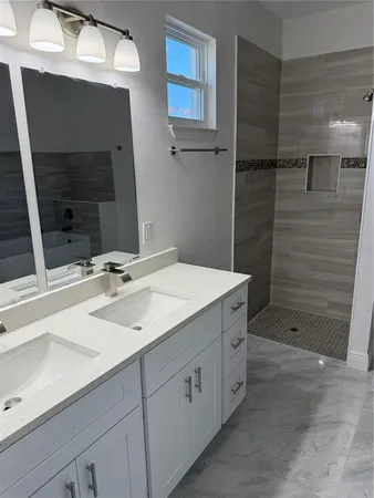 a bathroom with a toilet and a bathtub