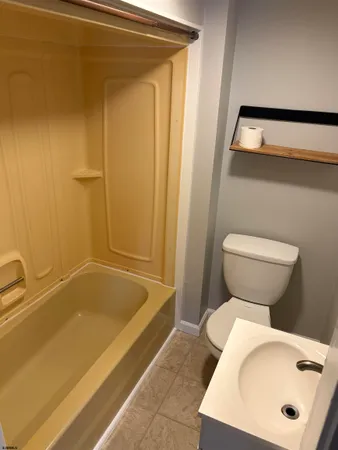 a bathroom with a sink and a toilet
