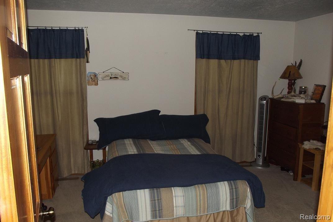 822 Tyrrell Road Bancroft, MI 48414 - Photo 6 of 9 Tyrell bedroom