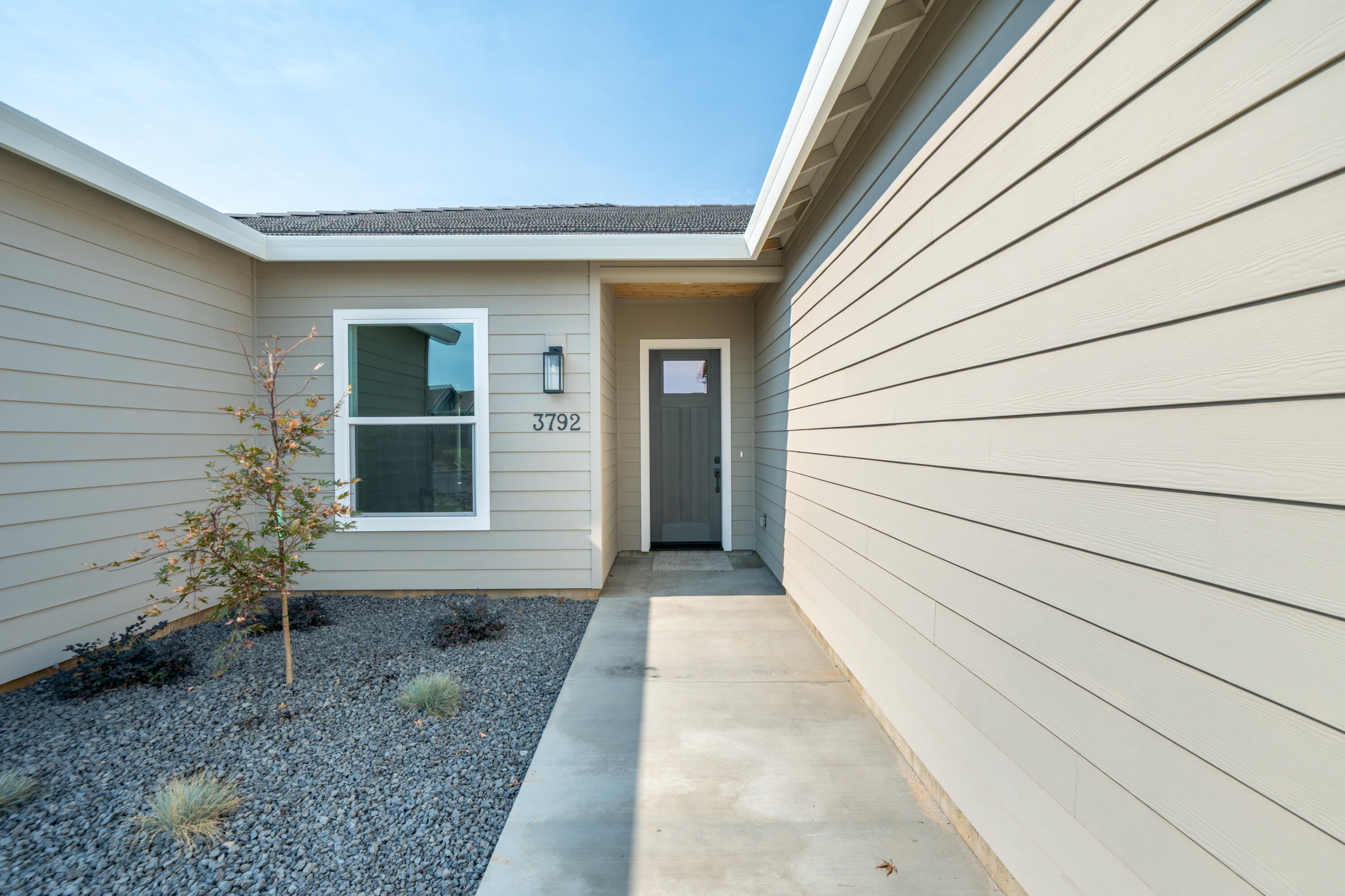 3792 Thomason Trail Redding, CA 96002 - Photo 3 of 42 a view of a house with a backyard