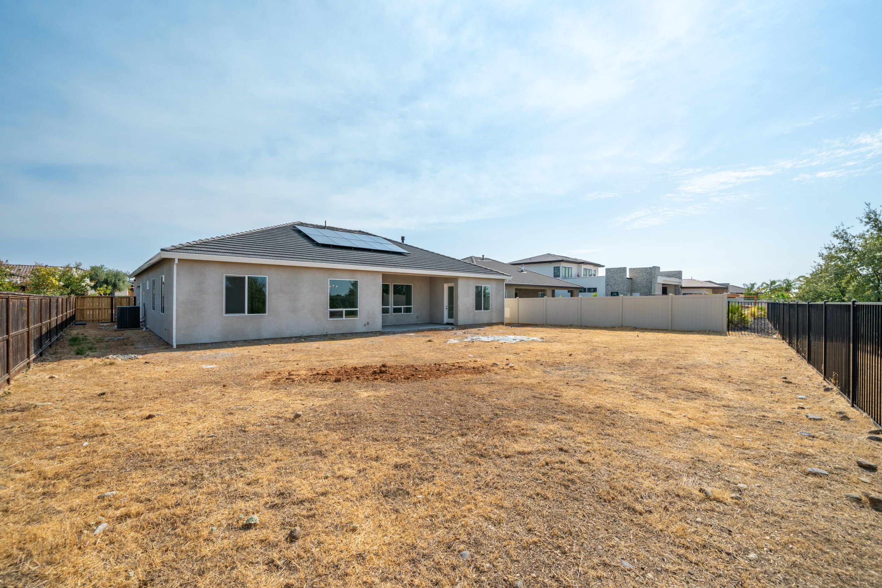 3792 Thomason Trail Redding, CA 96002 - Photo 35 of 42 a backyard of a house with large trees