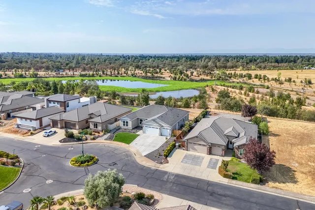 an aerial view of a city with lots of residential buildings